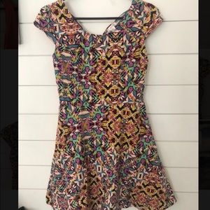 Bright printed skater dress with back cutouts